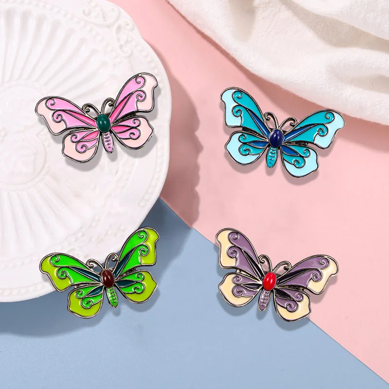 Довольно красочные булавки на тему бабочки розовые синие фиолетовые зеленые