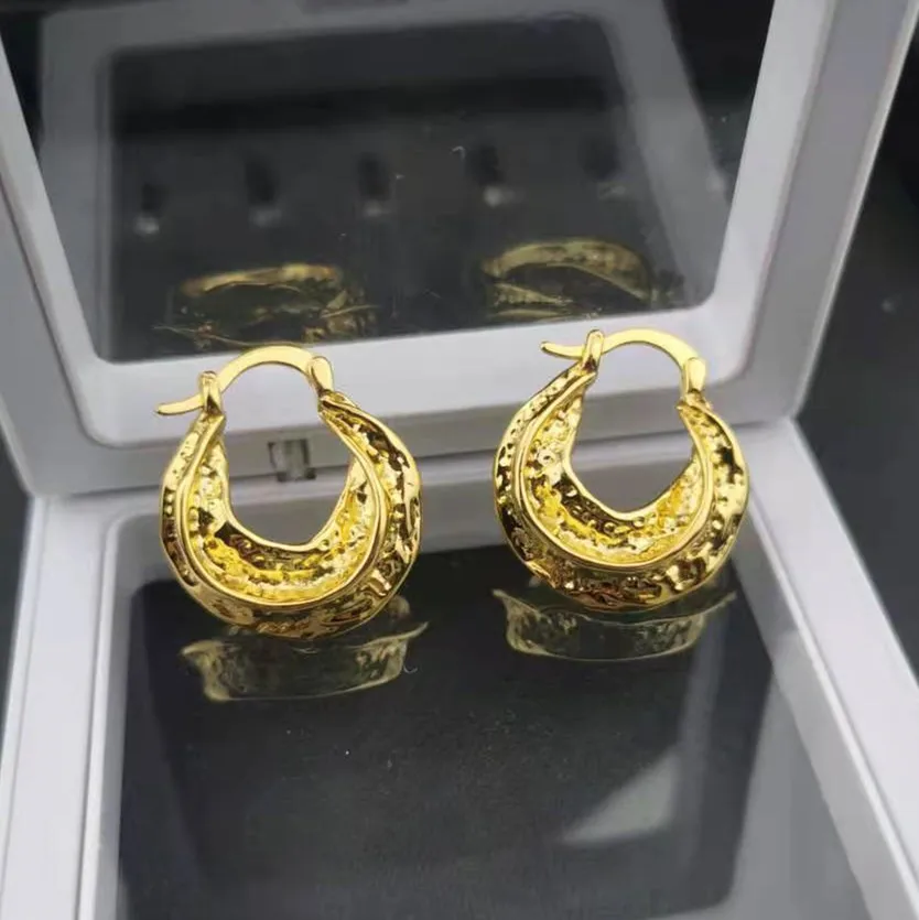 

New French Celi style retro hammered style with concave and convex texture earrings for women