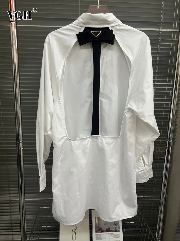 

Женское платье с бантом, открытой спиной и длинным рукавом