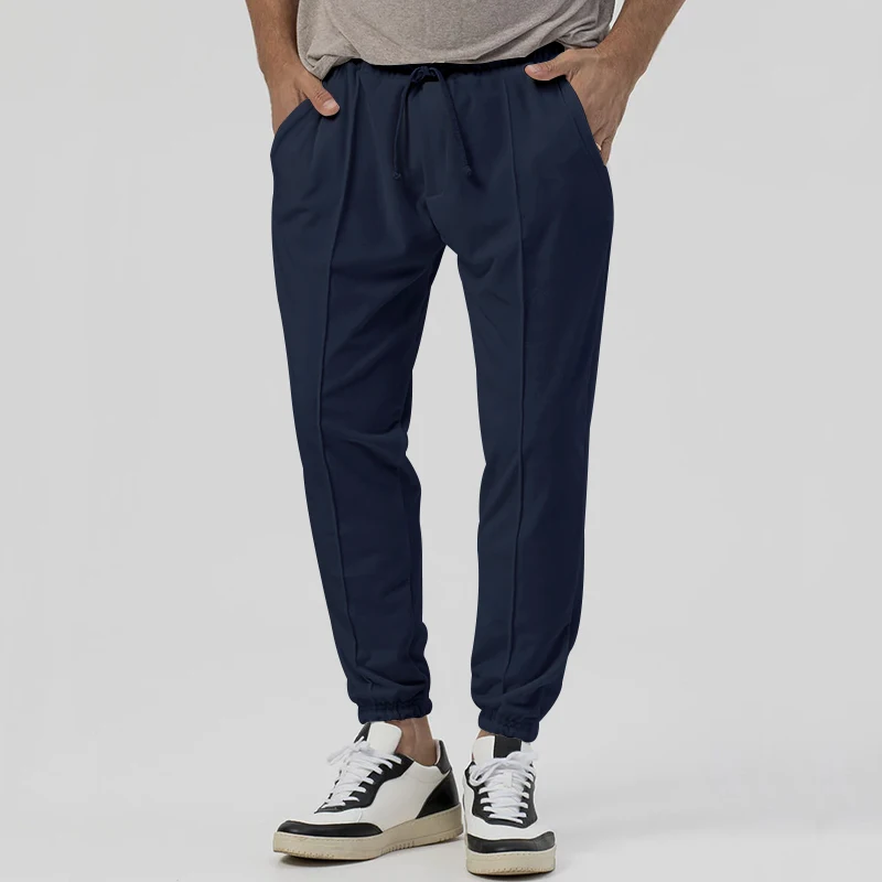 

2023 new men's drawstring waist pure color fashion versatile casual pants with tapered legs, large quantity and great price.