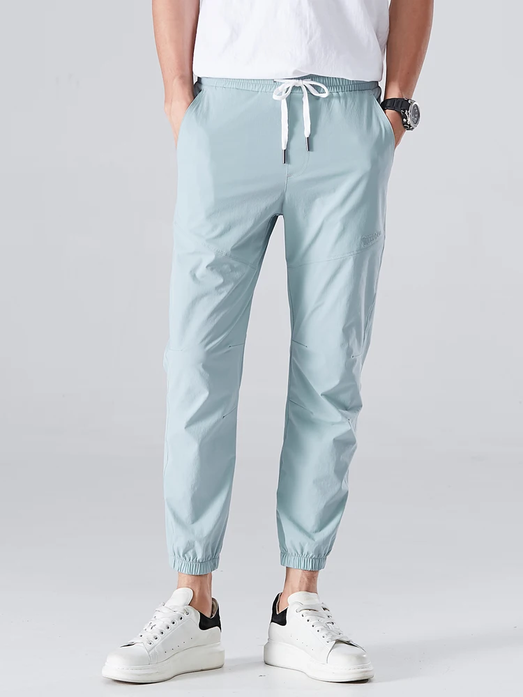

2022 New Men's Sweatpants Quick Dry Joggers Breathable Cool Stretch Nylon Light Thin Casual Track Pants Unisex Couples Trousers