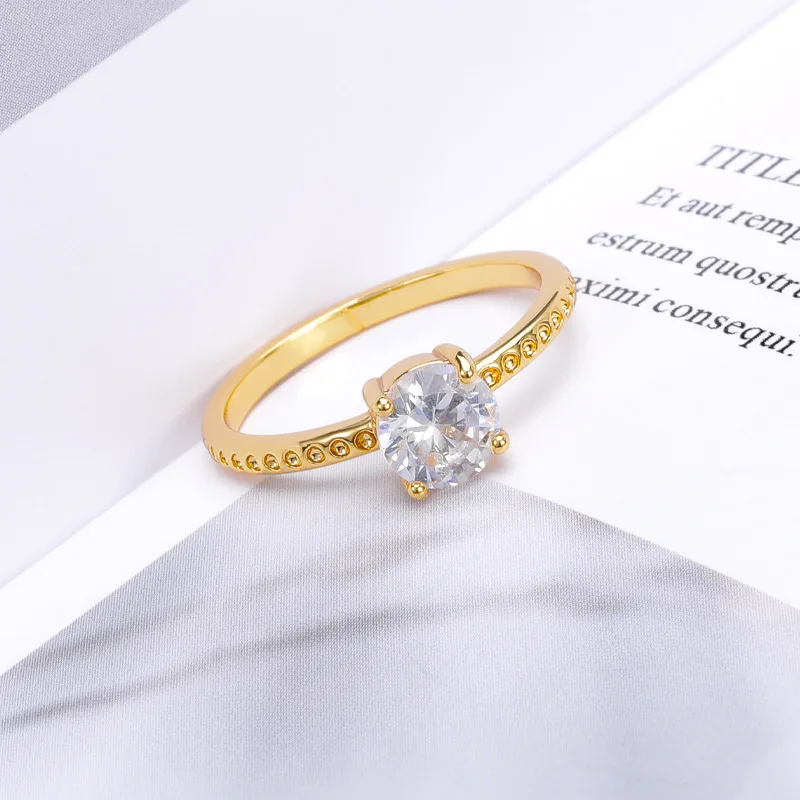 

Модное простое модное позолоченное классическое женское кольцо с четырьмя зажимами из циркония, оптовая продажа от производителя