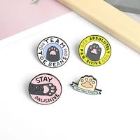 creative fashion minimalist design cartoon cat paw letter brooch creative cute cat paw letter round clothing badge pin