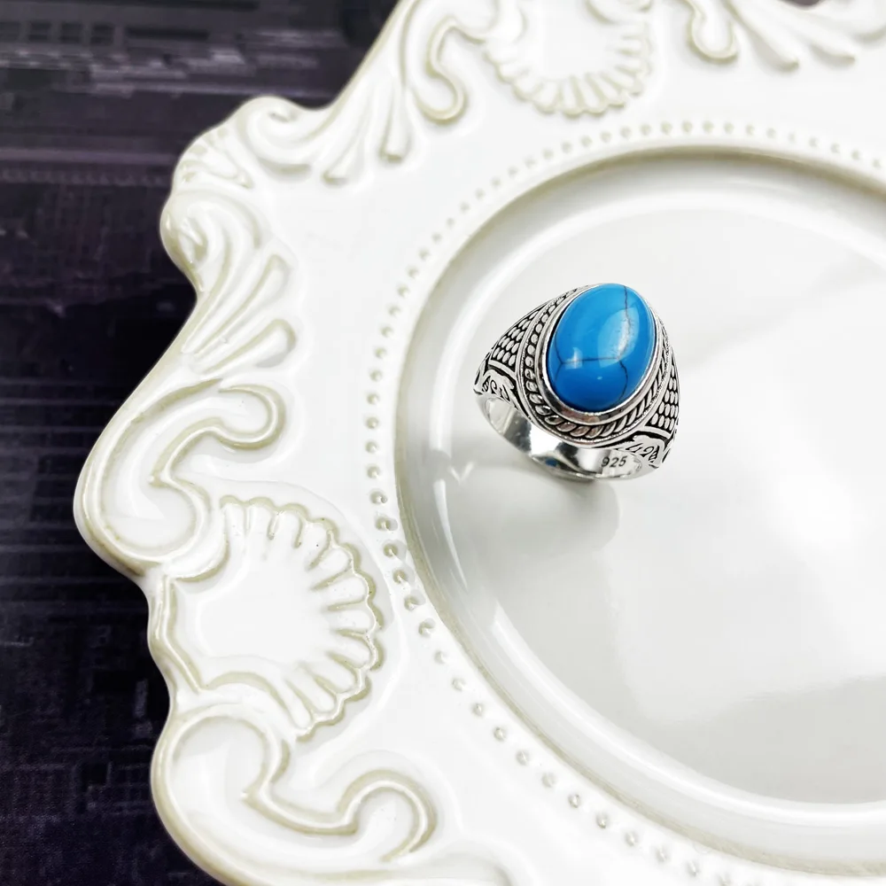 Коктейльное кольцо коричневый тигровый глаз овальный синий камень