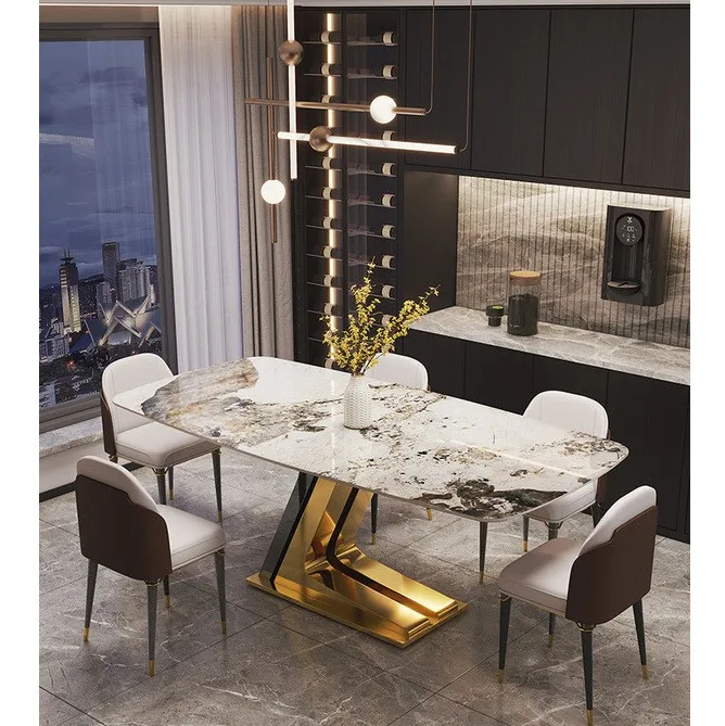

Light luxury marble dining table and chairs combination of simple household round dining room dining table