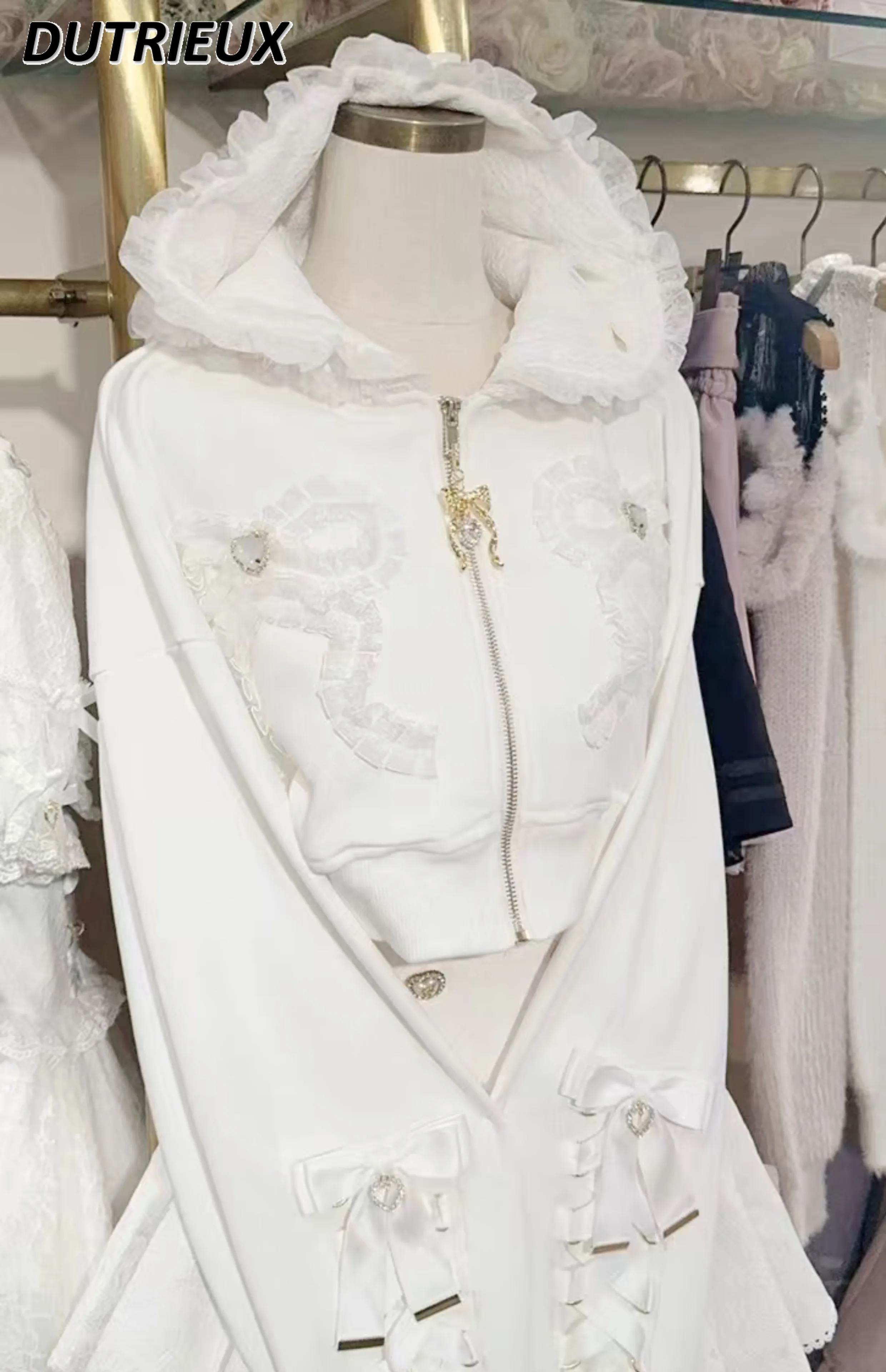 Женская толстовка со стразами и бантом