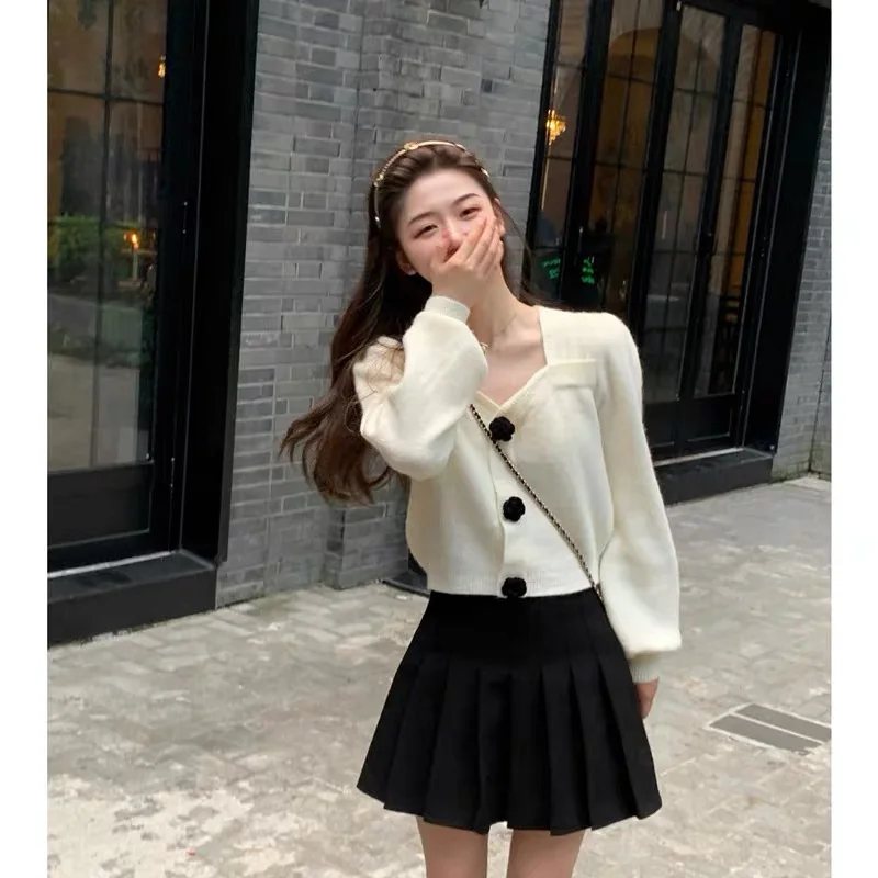 

2023 Autumn/Winter New Fashion Casual Loose Solid Sweater Long Sleeve Single breasted Top Short Skirt Two Piece Set