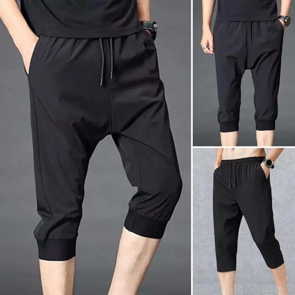 

Men Sweatpants Solid Color Soft Fabric Drawstring Ankle-banded Stretchy Waist Cropped Trousers Daily Clothes