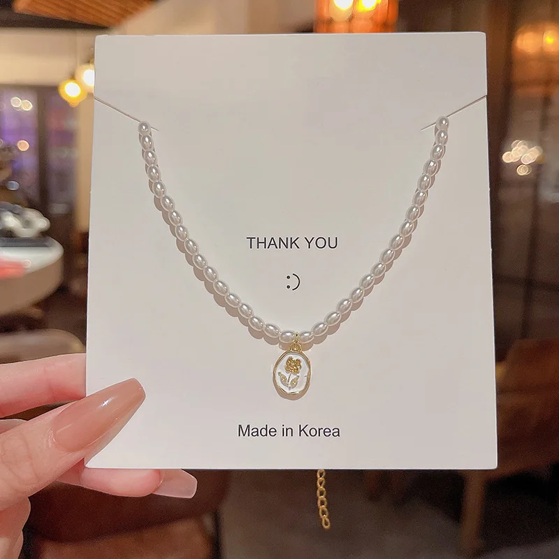 

New Fairy Imitation Pearl Flower Necklace Cold Style Sweet Simple Rose Pendant OT Buckle Clavicle Chain Women Wholesale Jewelry