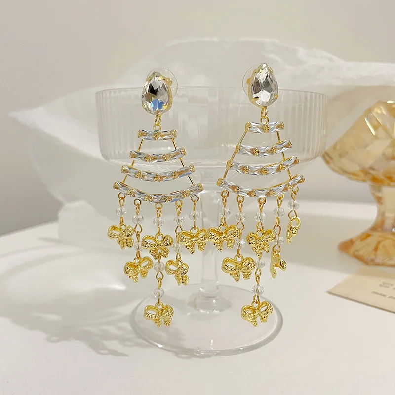 Элегантные роскошные круглые блестящие серьги-подвески с крупными кисточками и фианитами для женщин