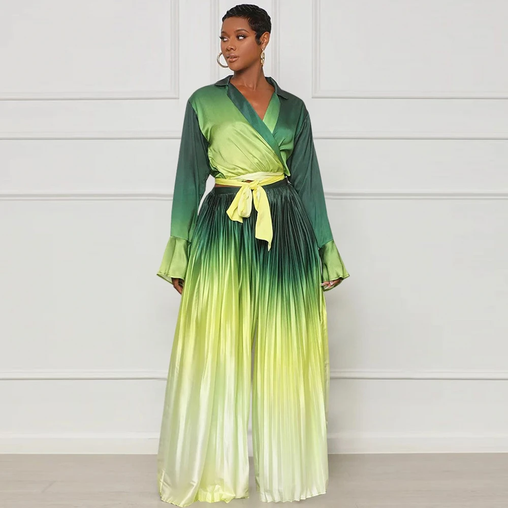 

Комплект из двух предметов африканская одежда Новые африканские Дашики модный костюм с цветочным принтом топ и брюки бриджи женская одежда