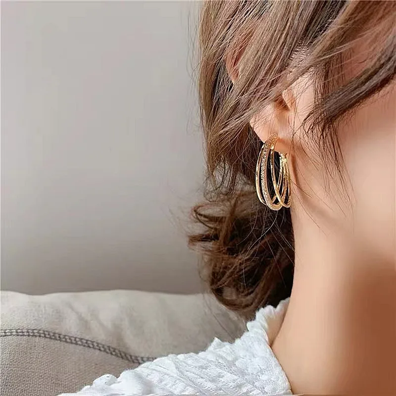 

Korea cold wind ins niche design earrings new S925 silver needle online celebrity diamond multi-layer C-shaped ear ring tide