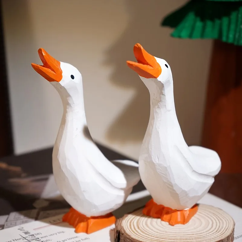 

Деревянная статуэтка гуся