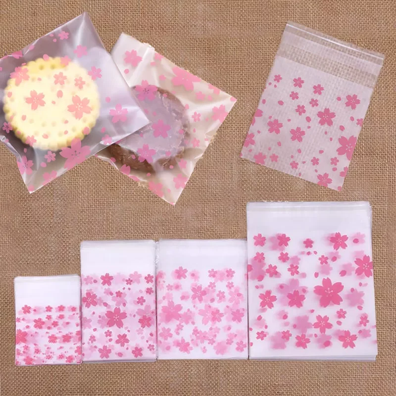 

50pcs 7x7 8x10 10x10 14x14cm Pink Cherry Blossom Printing Transparent Gift Bags Pouch for Party Bags Birthday Candy Package Bag