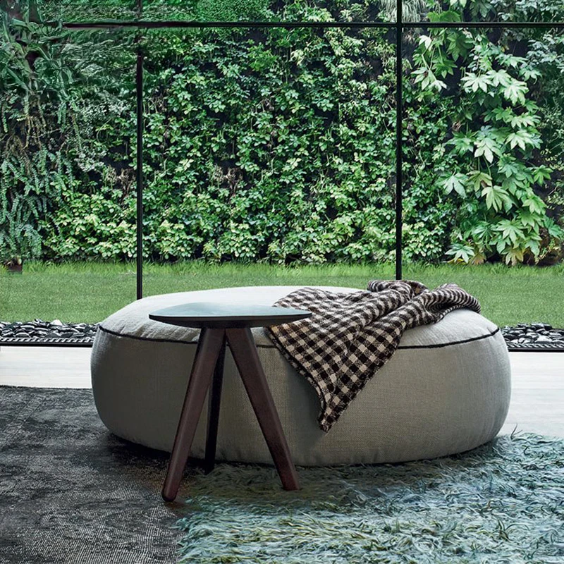 

Minimalist fabric sofa, footrest in living room, footstool in clothing store, sample room, modern and simple large round stool