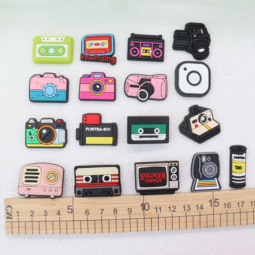 

Mix 50PCS PVC Croc Charms Radio Tape Camera Television Hole Shoes Ornaments Button Decoration Slipper Accessories Fit Wristbands