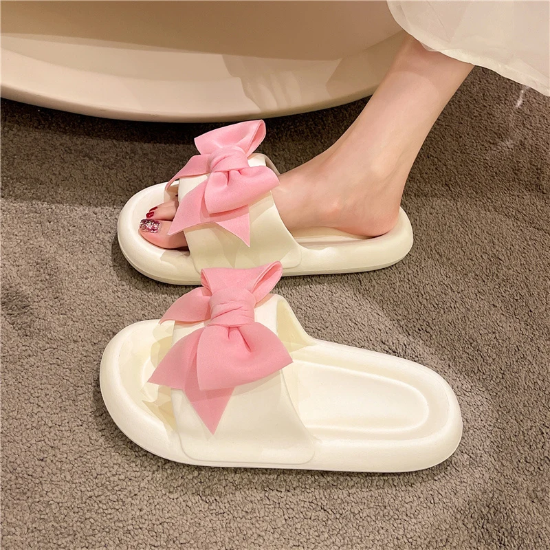 

Шлепанцы женские домашние резиновые на плоской подошве с бантом-бабочкой