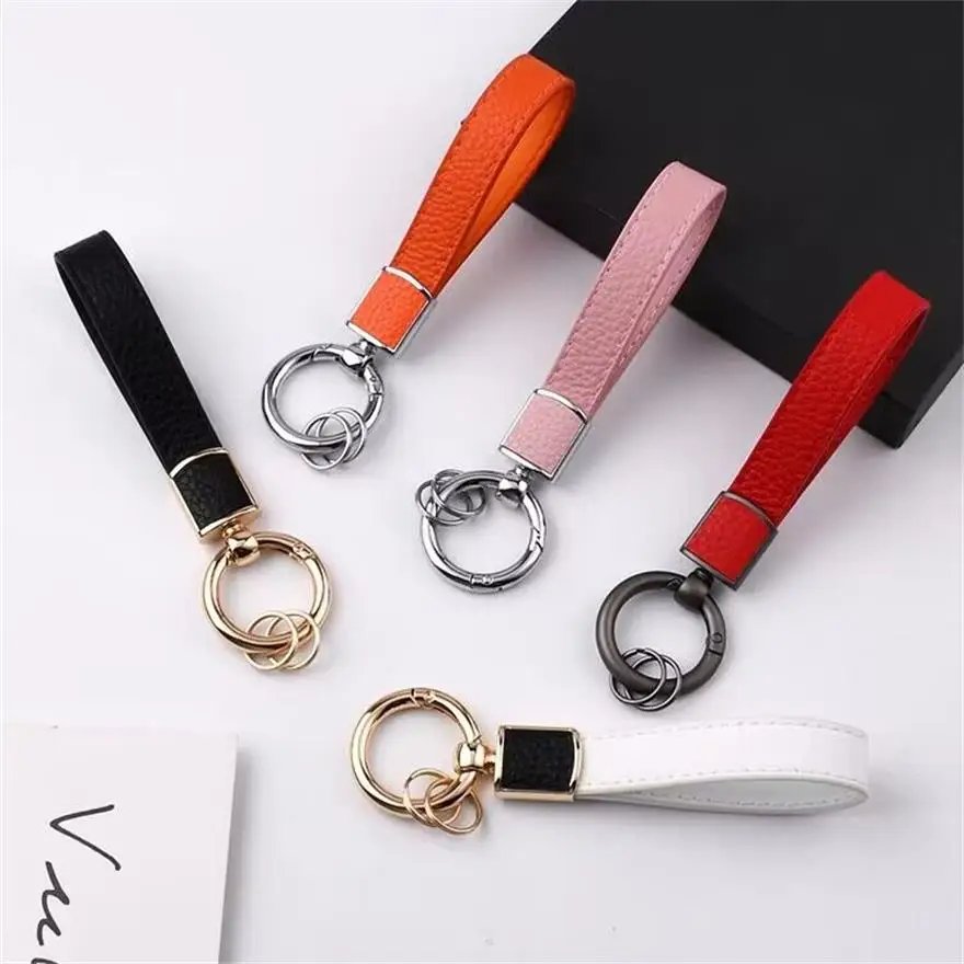 

Car keychain frosted head layer cowhide spring ring key pendant gift