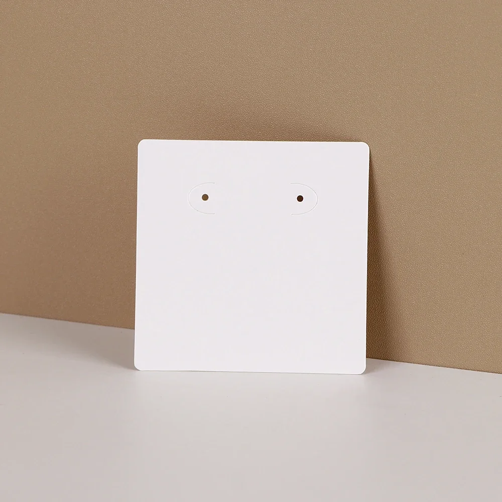 

50 шт. 7x7 см серьги для демонстрации ювелирных изделий бумажная карта с или без сумок оптовая упаковка бизнес-поставщик настройка обслуживания