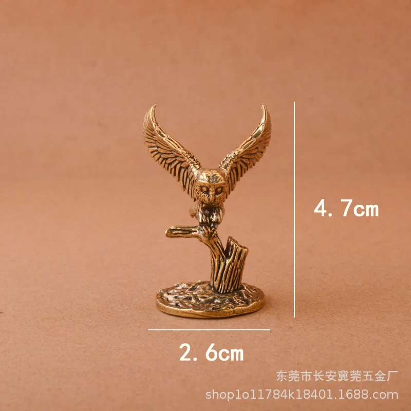 

Миниатюрные фигурки совы из латуни