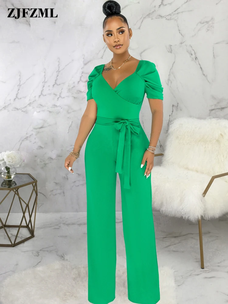 

Женский деловой комбинезон с глубоким V-образным вырезом и коротким рукавом