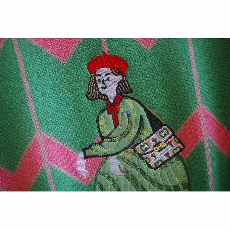 Женский трикотажный пуловер с вышивкой и блестками круглым вырезом