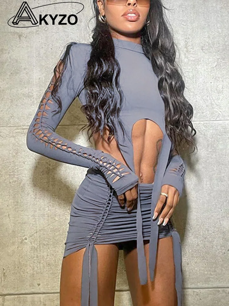 

Women Skirts Sets Sexy Hollow Out Two Piece Sets 2023 Autumn Long Sleeve Crop Tops And Mini Skirts Suits Club Party Dresses Sets