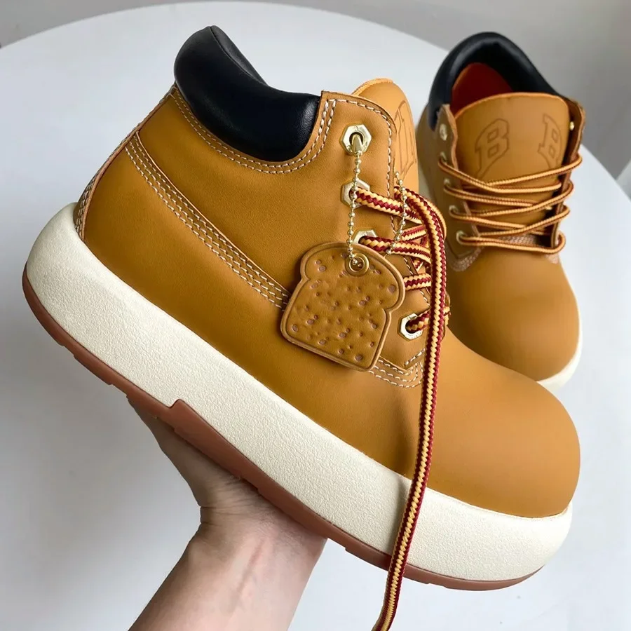 Женские ботинки на толстой подошве желтые брендовые платформе с круглым носком