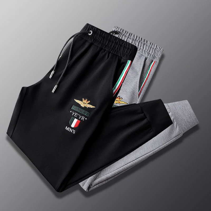 

fashion embroidery casual European 2023 spring and autumn new loose large sports pants men's handsome Leggings