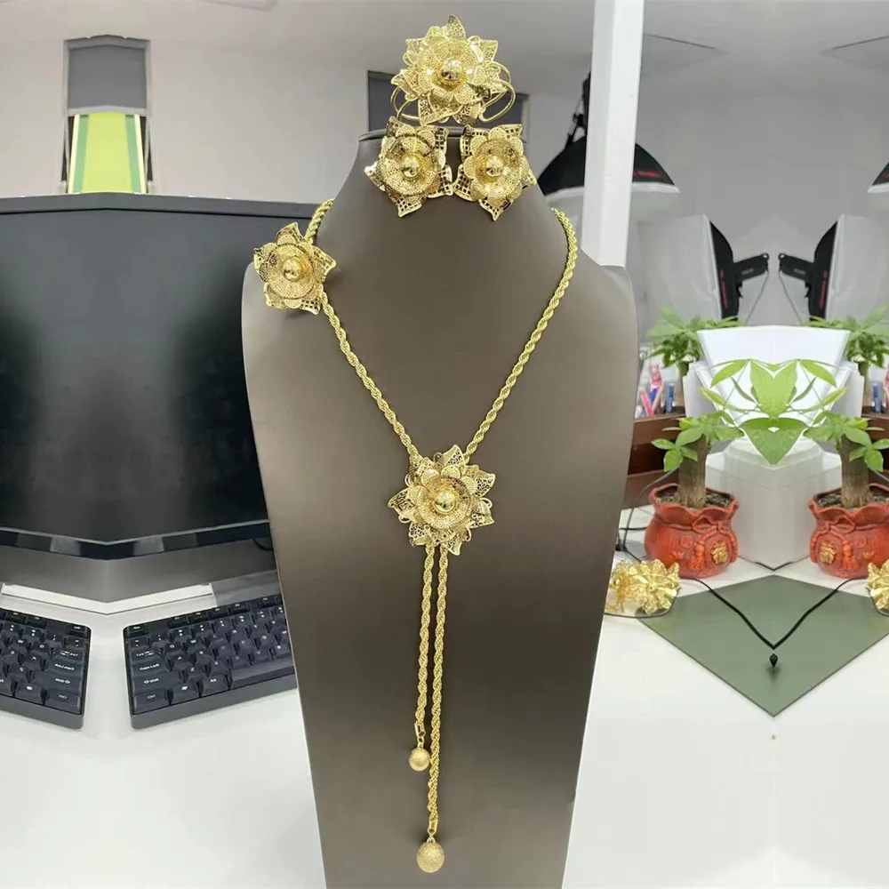 Модный женский комплект золотых ювелирных изделий, кулон с цветком, длинное ожерелье, браслет, серьги, кольцо для Дубая, африканские свадьбы...