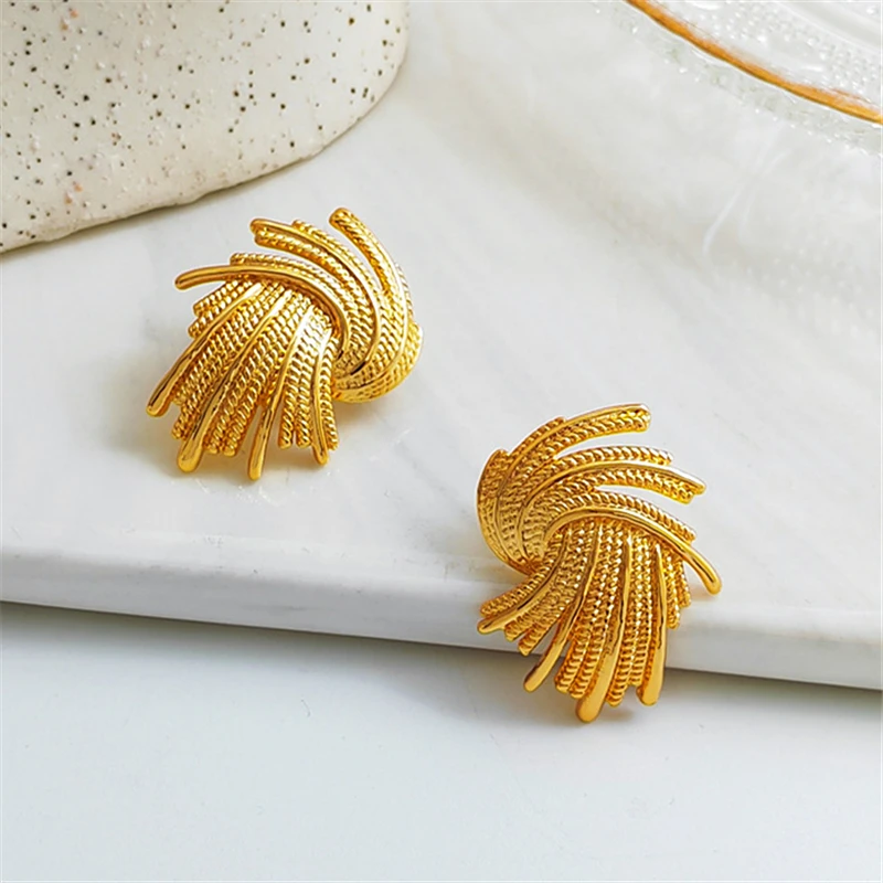 

2023 Vintage woven fireworks studs Fashion feminine temperament earrings