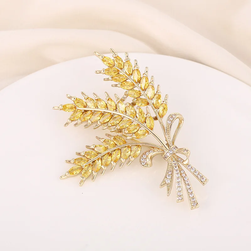 Autumn and winter crystal wheat ear brooch high-end temperament big selling anti-failure silk scarf buckle waist pin |