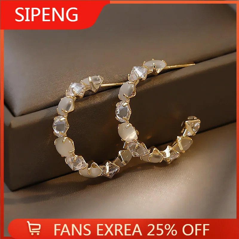 

Женские серьги-кольца с опалом, золотого цвета