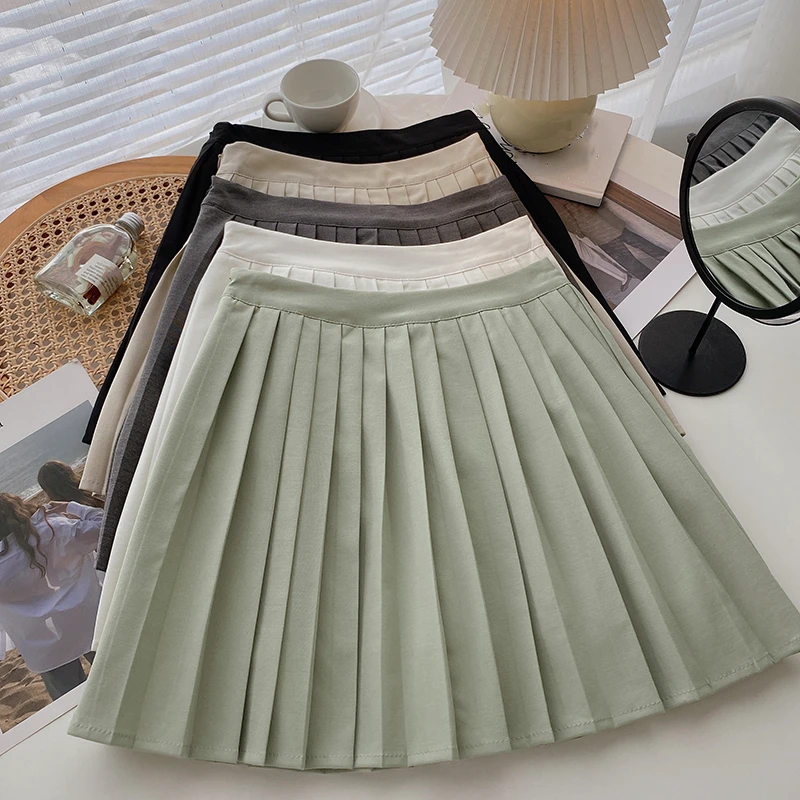 

Женская юбка с высокой талией в Корейском стиле, повседневная однотонная мини трапециевидная облегающая короткая юбка, милая плиссированная Женская юбка на молнии в стиле Харадзюку