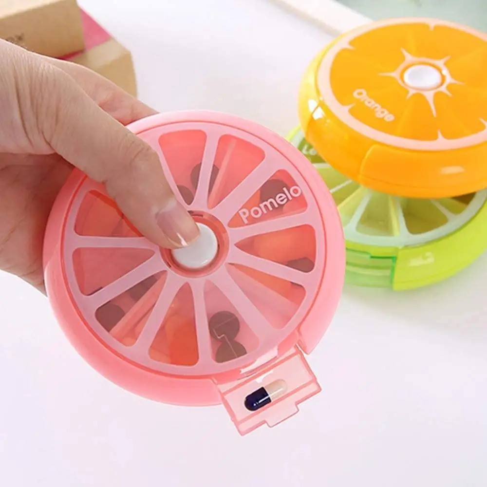 

Button-Rotating Pill Organizerhe Pill Box has Seven Separate compartments