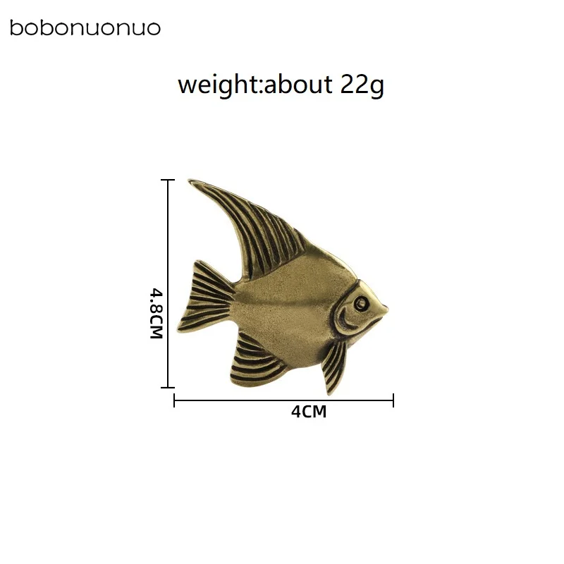 

Латунная статуэтка рыбы