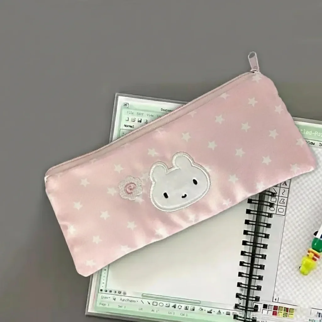 

Розовая плюшевая сумка для ручек