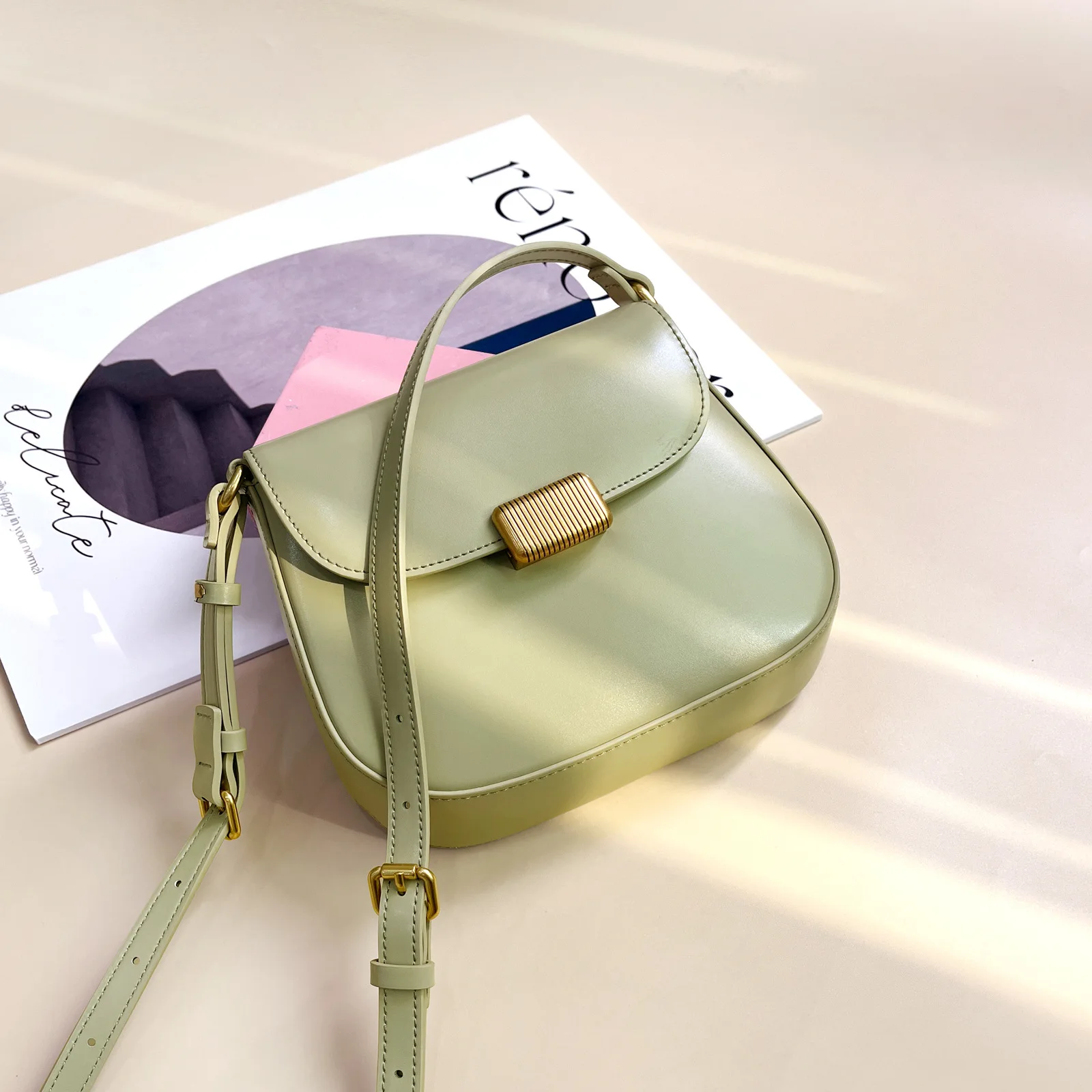 Женская сумка-седло из натуральной кожи