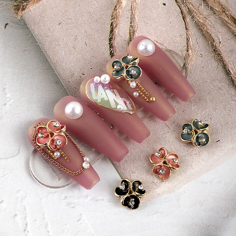 

10pcs/lot, 3d Nail Art 3D Phnom Penh Small Flower Ornament Polygonal Pearl Flower Nail Rhinestones For Nail Tips Decorations