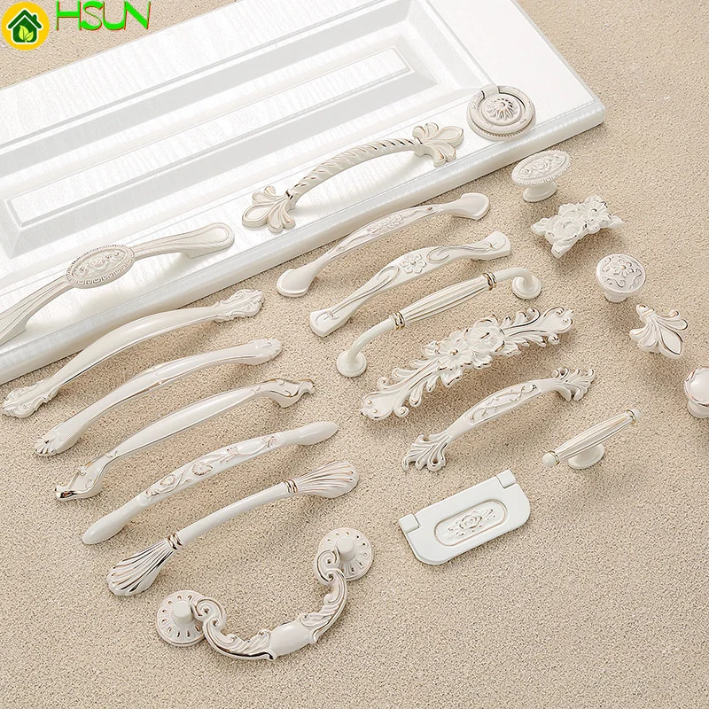 

2 pcs Ivory handle door handle cupboard drawer zinc alloy European modern simple single hole round products thickening