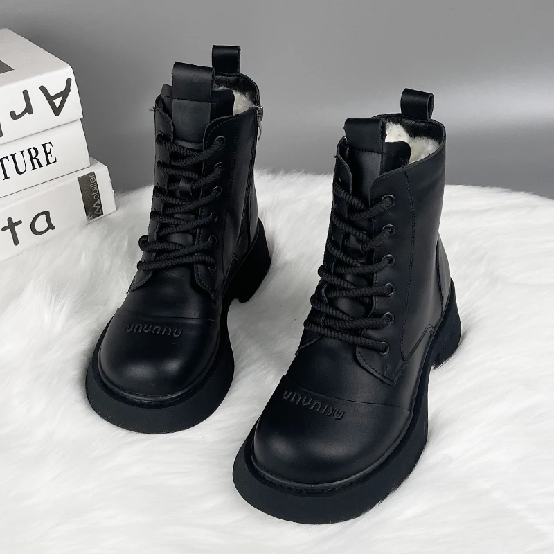 Женские кожаные сапоги с круглым носком на молнии каблуком