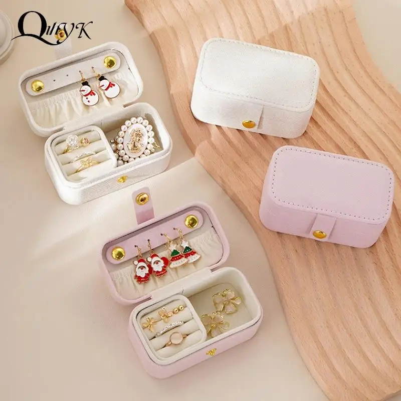 

Портативная шкатулка для ювелирных украшений, компактный дорожный Органайзер из высококачественной искусственной кожи для хранения цепочек, серег, колец, женский ювелирный чехол