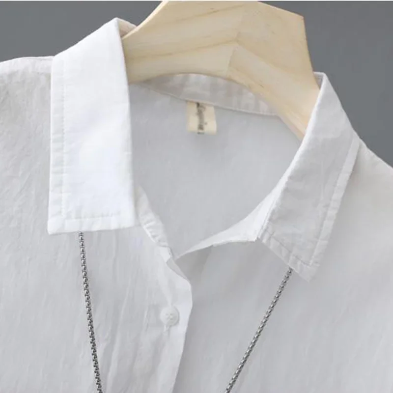 Однотонная хлопковая однобортная женская блузка Yelow с воротником-поло и коротким