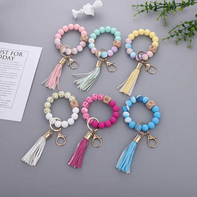 

Rainbow Color Silicone Beads Keychain Beaded Bracelet Fashion Keyrings with Tassel Women Wrist Round Silicone Keychians 2020 NEW