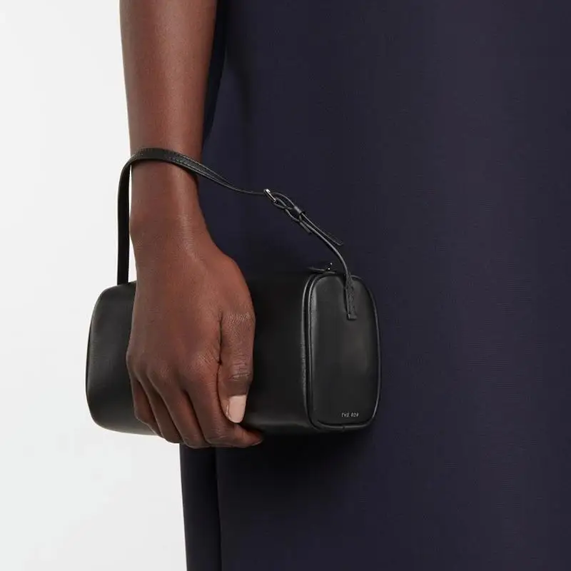 

Row Bag Pencil Bag Retro Simple Handheld Bag Cowhide Penholder Bag Mini Underarm Handbag for Women
