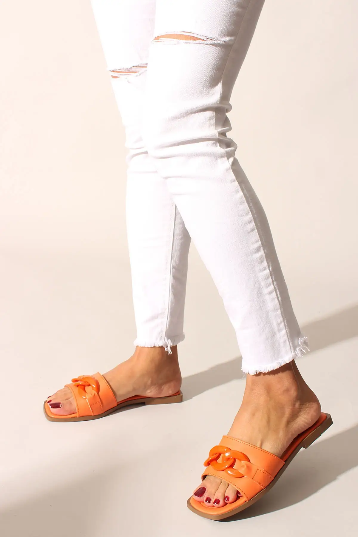 

Orange skin women slippers