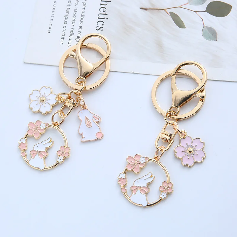 

ZXMJ Cartoon Cute Keychain Charms Trend Car Key Pendant Sakura Rabbit Garland Keychains for Girls Schoolbag Pendants Key Jewelry