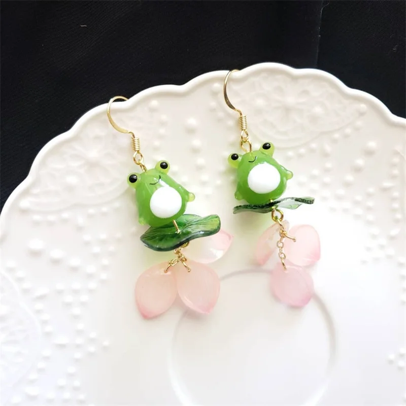 

Frog on lily pad earrings, Frog and floral petals Lovely drop earrings