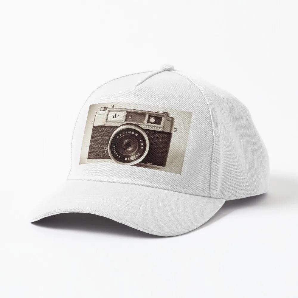 

Кепка в стиле ретро для камеры, разработанная и продаваемая Tuky Waingan