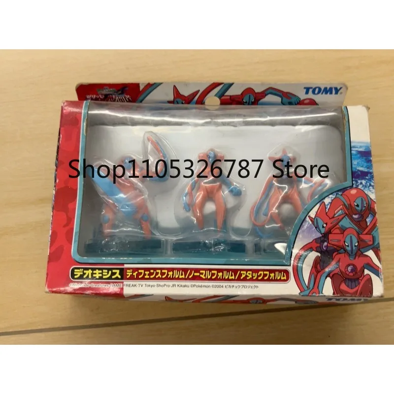 Фото Оригинальный подарочный набор TOMY Deoxys AG, три фигурки в разных позах (оранжево-синие), абсолютно новый, в комплекте с оригинальной заводской коробкой. №1